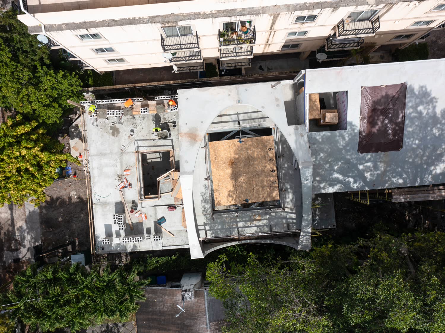 Before glass: a roof opening formed and decked. Cutting a hole in a structural roof means adding steel around it, not…