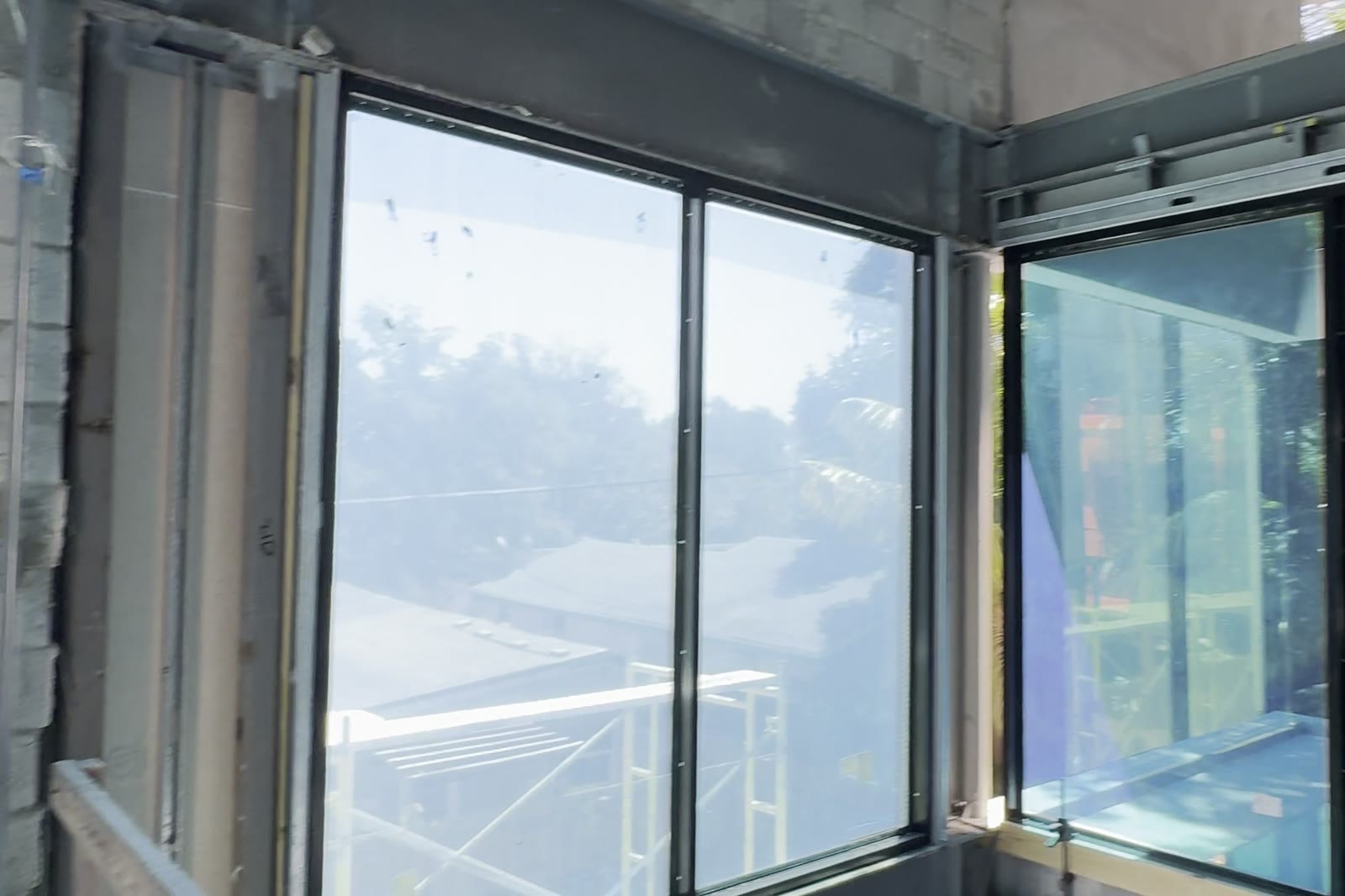 Glazed corner, two walls of glass meeting with no column between them.