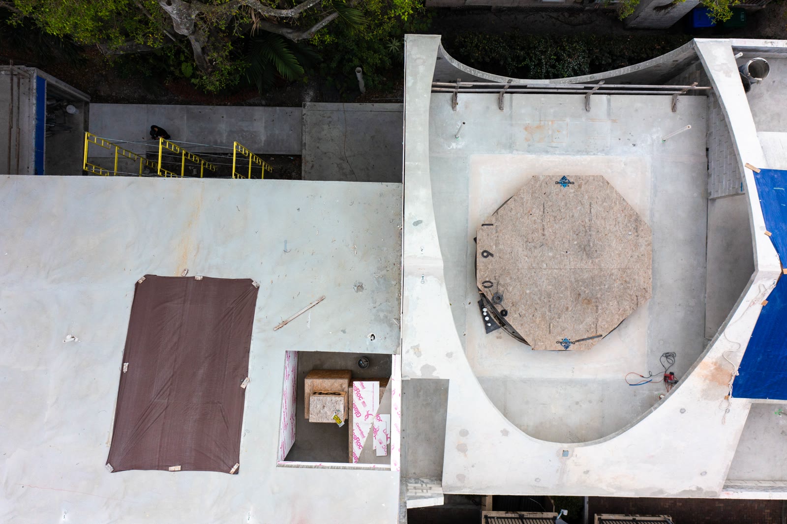 Closer. The vessel arrived crated and finished — one piece, lidded for the lift, still carrying the fabricator's mark.
