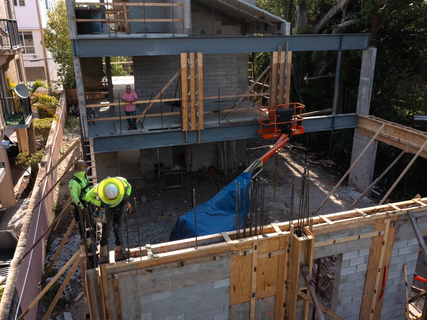Column formwork, rebar and steel stacked on a footprint with no lay-down space.
